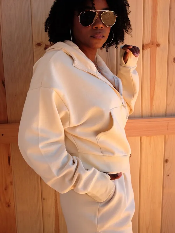 Shanté modeling a cream Cocoburry athleisure set, photo 7