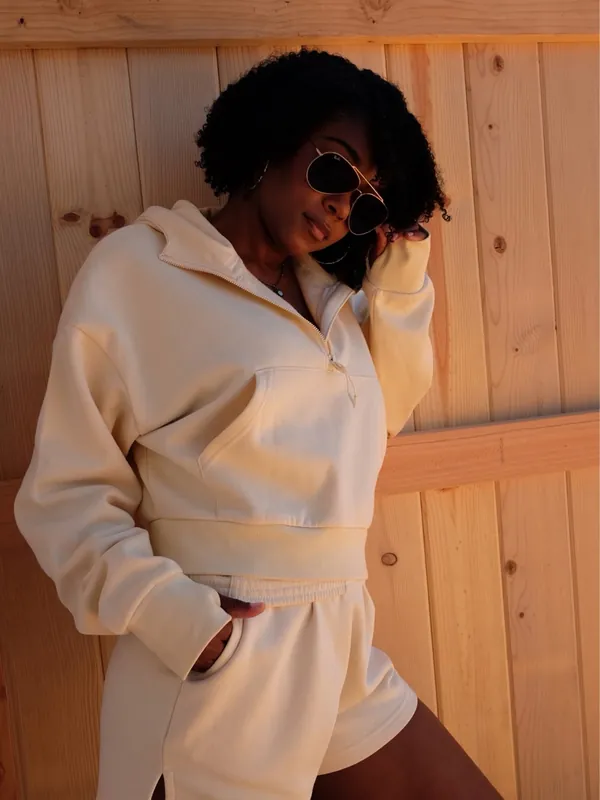 Shanté modeling a cream Cocoburry athleisure set, photo 12